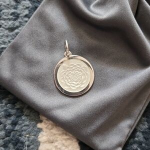 Colby Davis of Boston Med. Lotus pendant